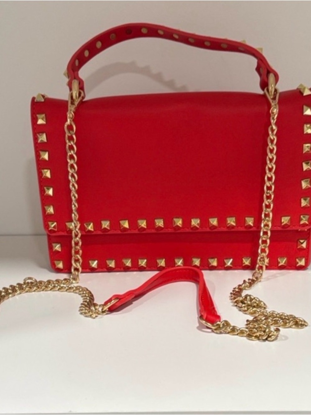 Elegant Red Crossbody Bag with Gold Accents